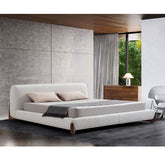 Malmo Bouclé Bed featuring oat latte fabric, steel frame, and eco-friendly FSC timber slats in a contemporary bedroom